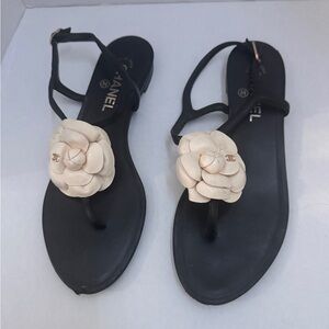 CHANEL Black Sandals with Cream Floral Accent